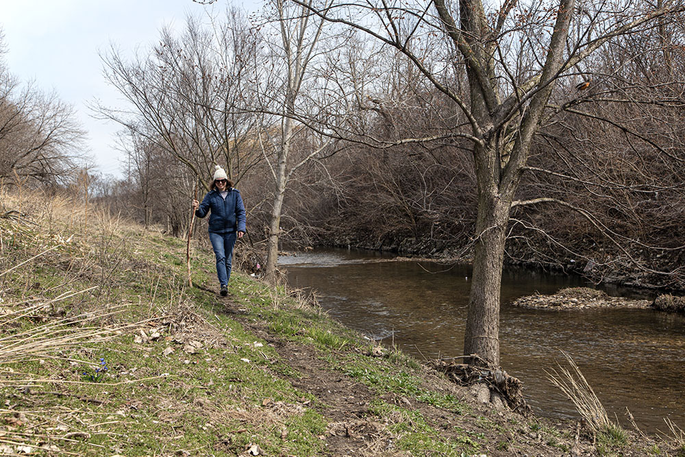 Kim Lamers takes an alternative path along the edge of Lincoln Creek.