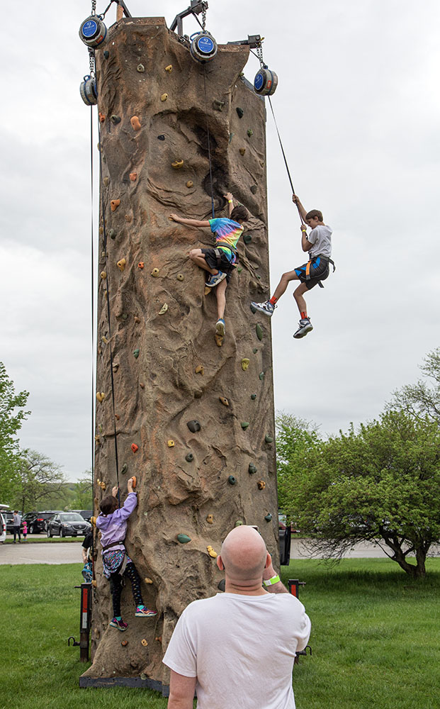 The rock climbing wall didn't open up until it stopped raining in the afternoon.