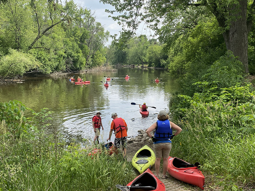 Setting out from the boat launch into the cool Milwaukee River corridor.