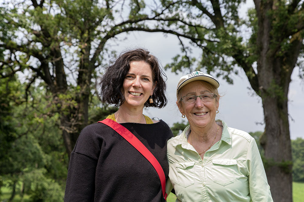 Megan Muthupandiyan with Susan Buchanan, Executive Director of Tall Pines Conservancy, at Ravensholme on the River. 