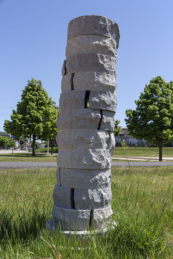 "Column" by P.M. Goulding (Wisconsin). Meant to evoke a stack of millstones in reference to gristmills used to turn grain into flour.