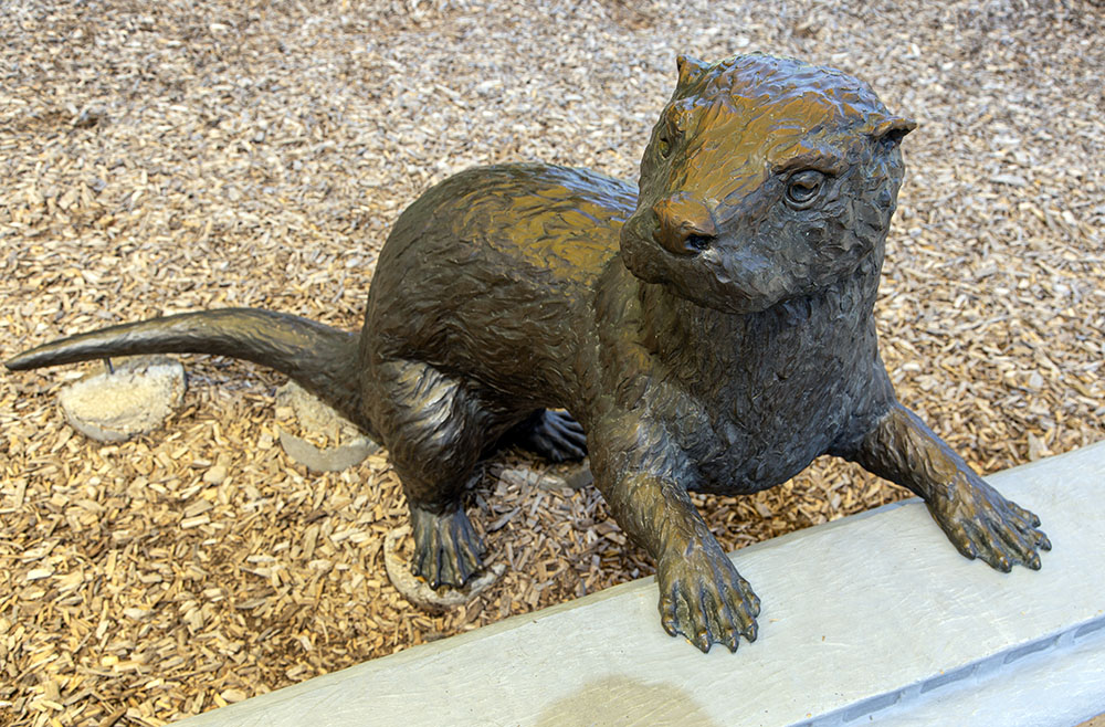 "River Depot" (detail of otter) by Jeremy Wolf. Cast bronze.