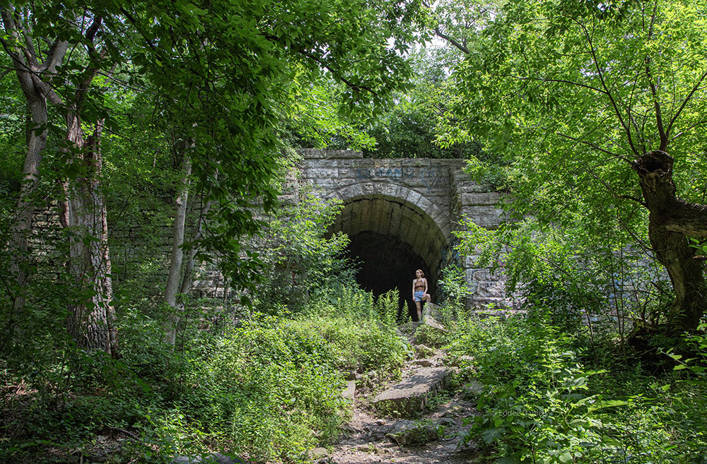 Haley Krob at the entrance to the "Tunnel to Nowhere" in Cambridge Woods, part of the Milwaukee River Greenway.