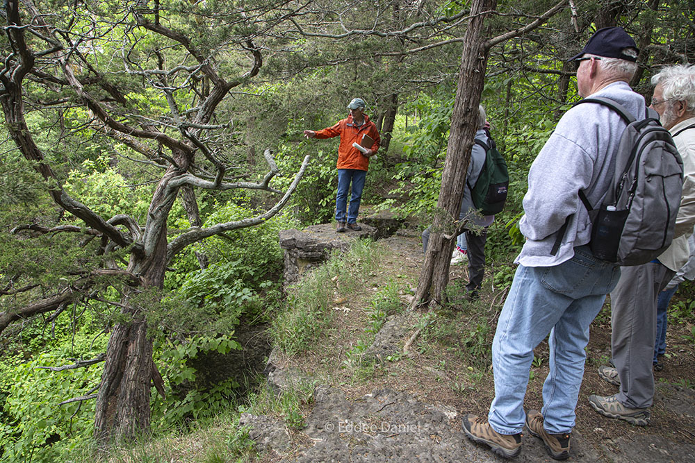 State Geologist Ken Bradbury (in red) at the edge of the ledge.