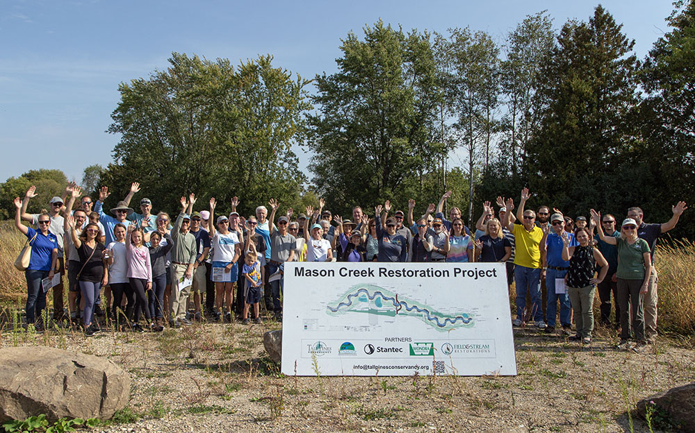 Group portrait of the ribbon cutting celebration.