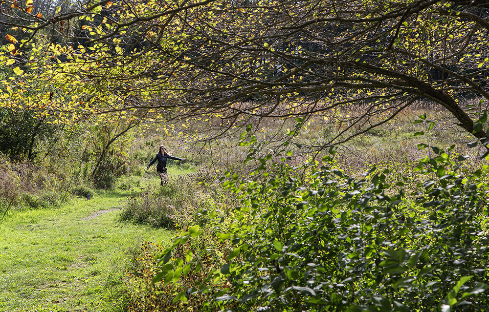 A dancer moving freely about the preserve.