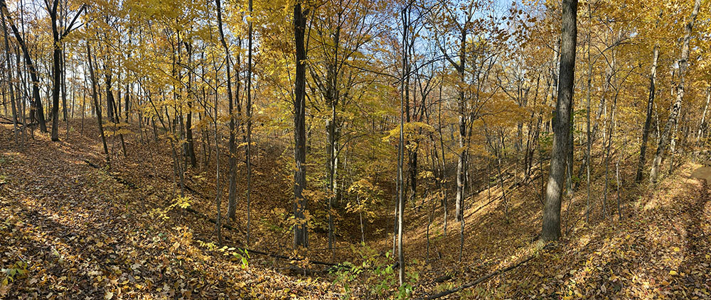 A panorama of the trail as it skirts around a kettle.