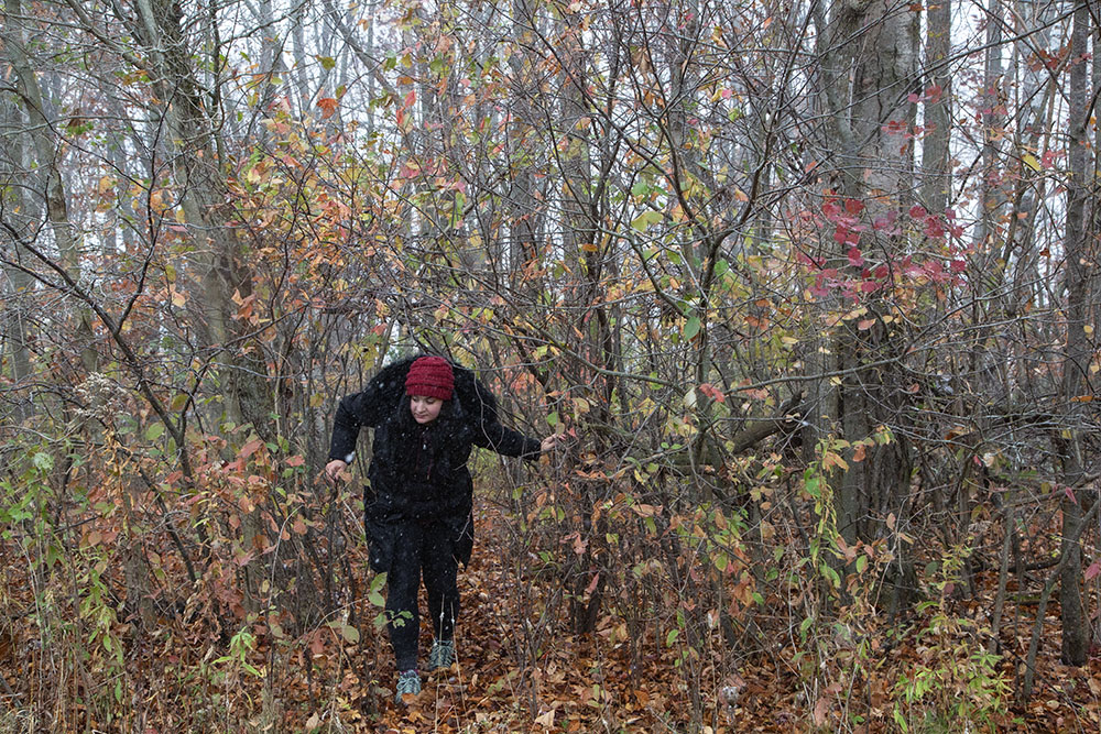 The artist exploring a narrow trail.
The artist exploring a narrow trail at Forest Beach Migratory Preserve.