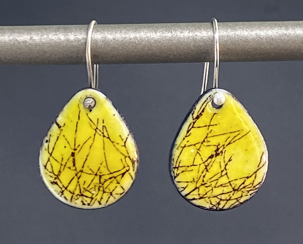 Earring yellow. Enamel and nature-inspired decal, fired on copper. Sterling silver earwires.