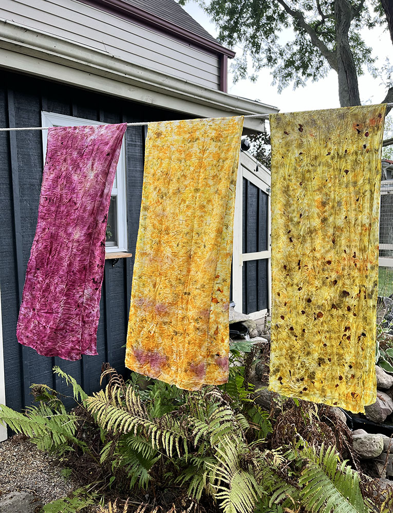 Wearable art silk scarves, bundle dyed with foraged goldenrod, sumac, and garden flowers.