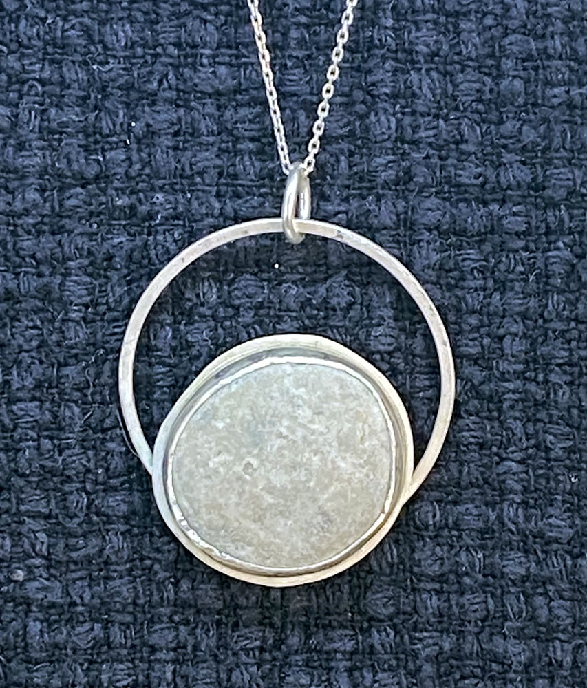 Pendant beach stone. Lake Michigan beach stone set in sterling silver.