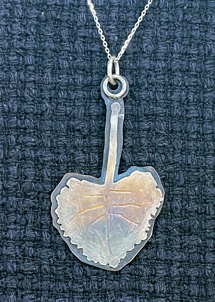 Pendant silver leaf. Sterling silver and copper with torch patina.