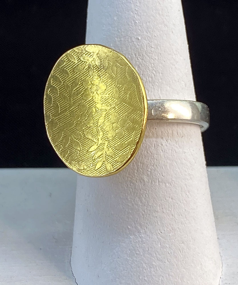 Ring reclaimed gold. Roller-printed recycled gold and sterling silver.