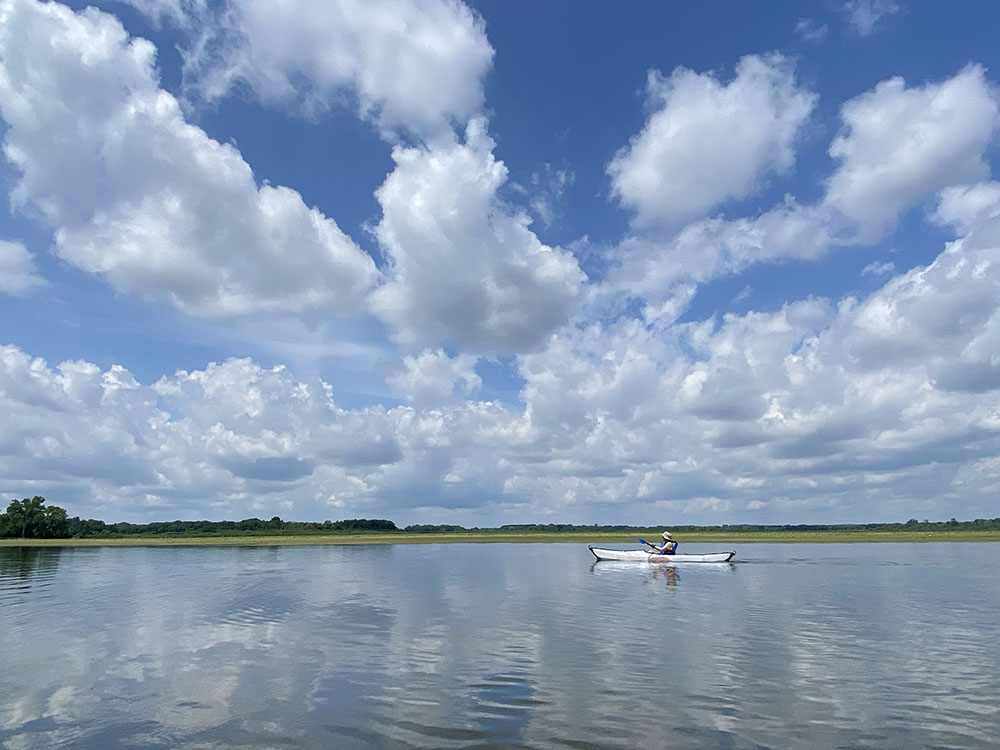 Kayaking the wide open spaces on the impounded Fox River at Tichigan Wildlife Area, Tichigan.