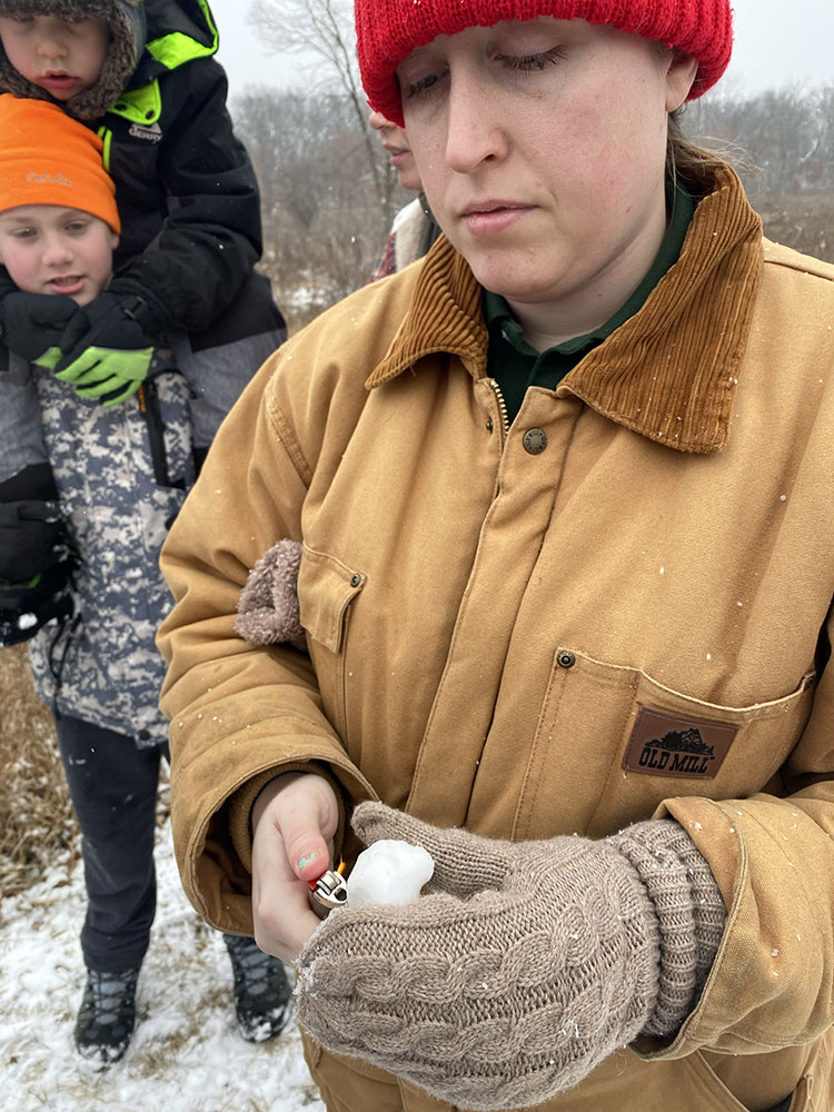 Checking for impurities in the snow.