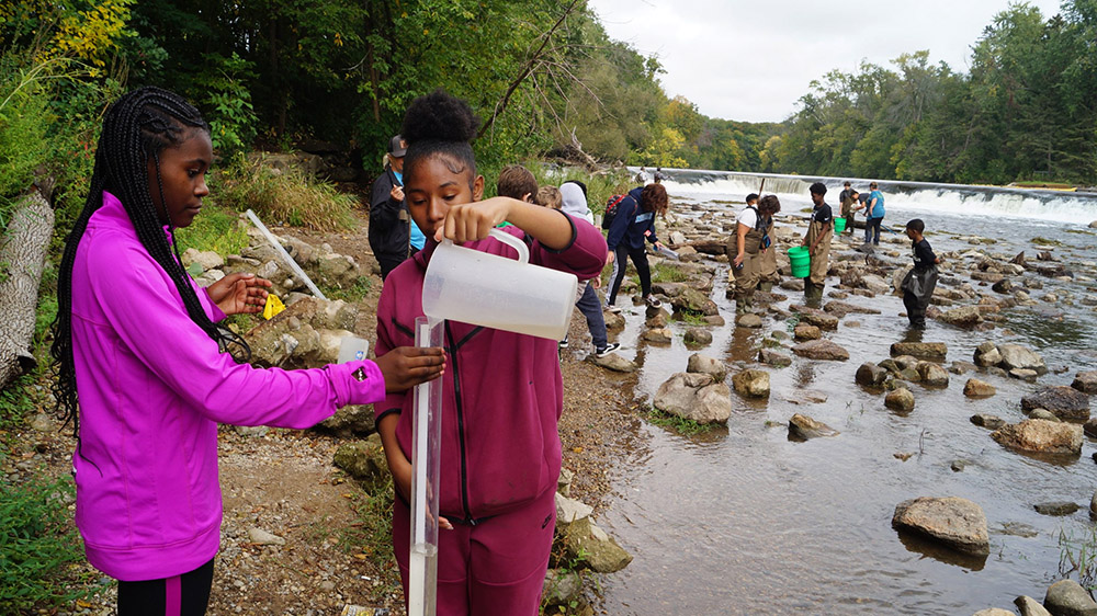 Seventh graders sampled the water's turbidity and tested for pH, dissolved oxygen, nitrate, and phosphate. They also measured the river's speed, temperature, and observed organisms.