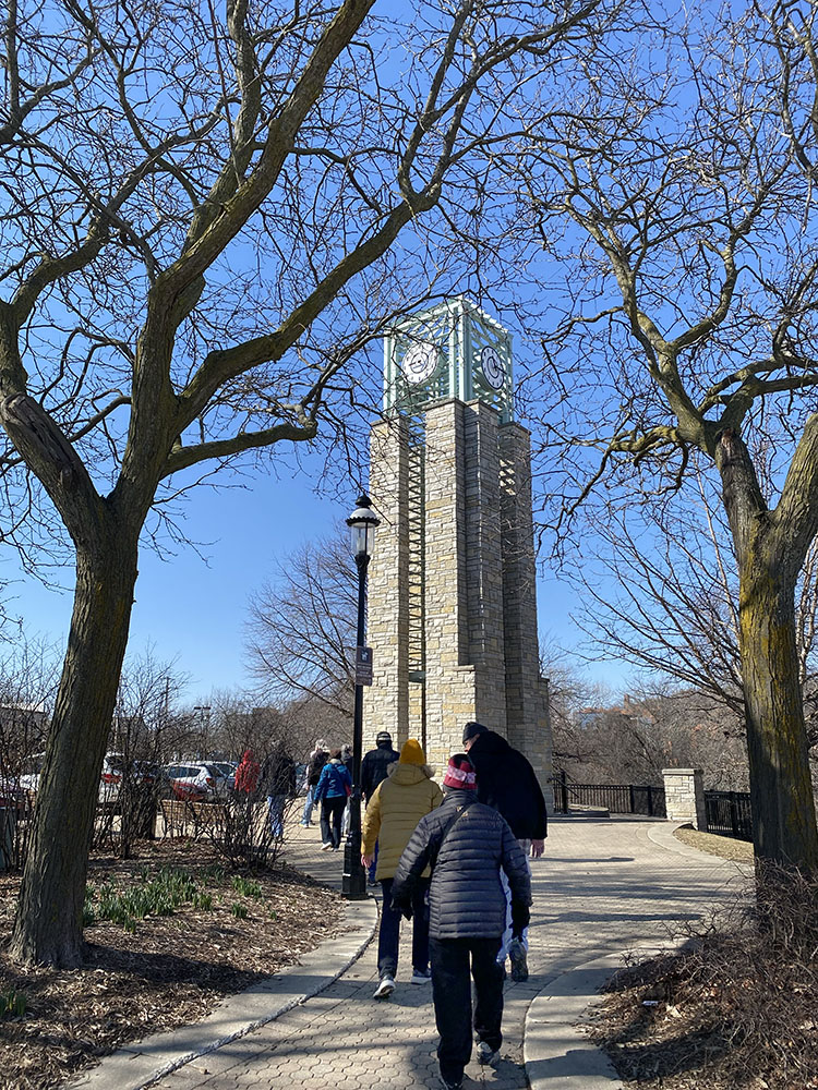 A rather grand clock tower graces the Fox River Trail just south of Frame Park.