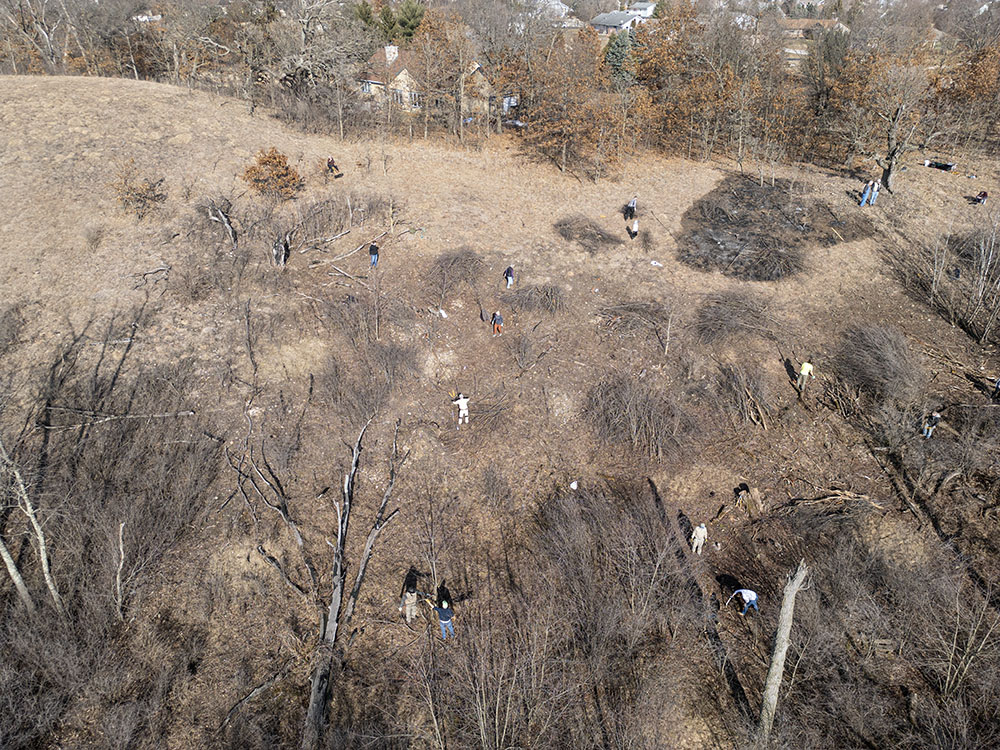 Aerial view showing the hillside being cleared. The small patch that burned is in the upper right corner. 