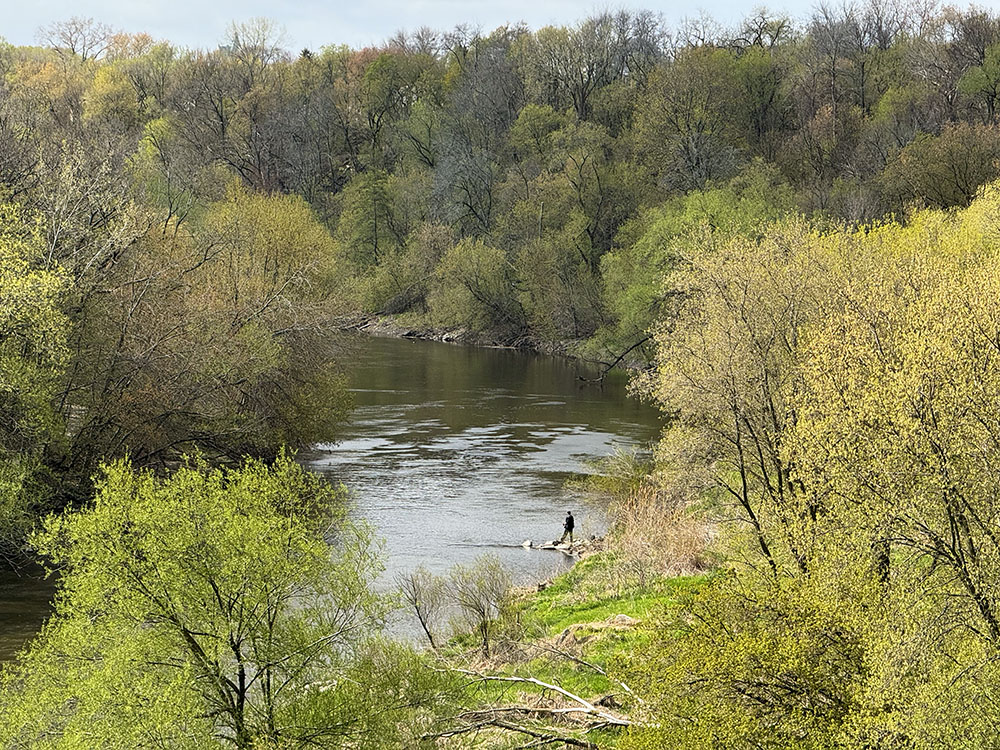 An angler enjoying the solitude in the Greenway at Gordon Park.