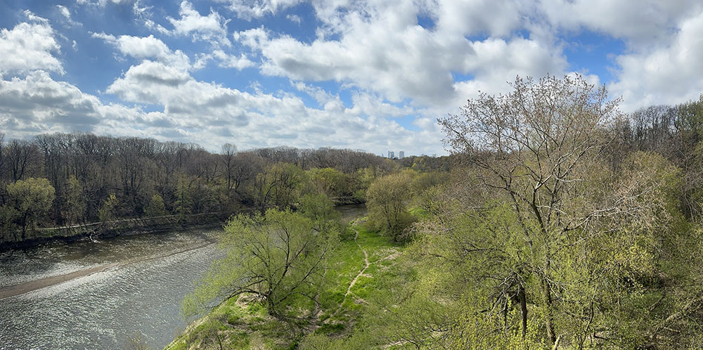 Panoramic view of the Milwaukee River Greenway and downtown from Locust Street.