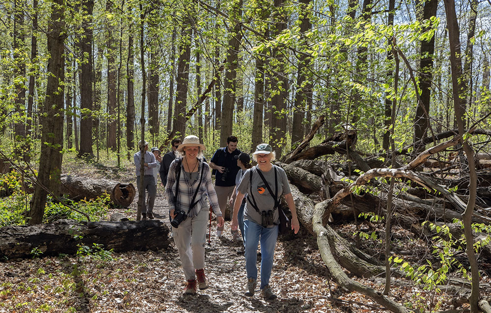 Members of the Wisconsin Metro Audubon Society delight in their tour of the forest.