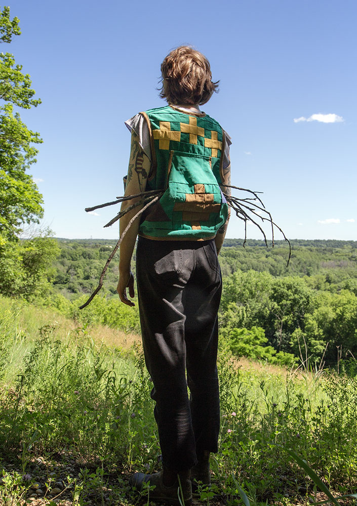 Amanda demonstrates the use of the "foraging vest."