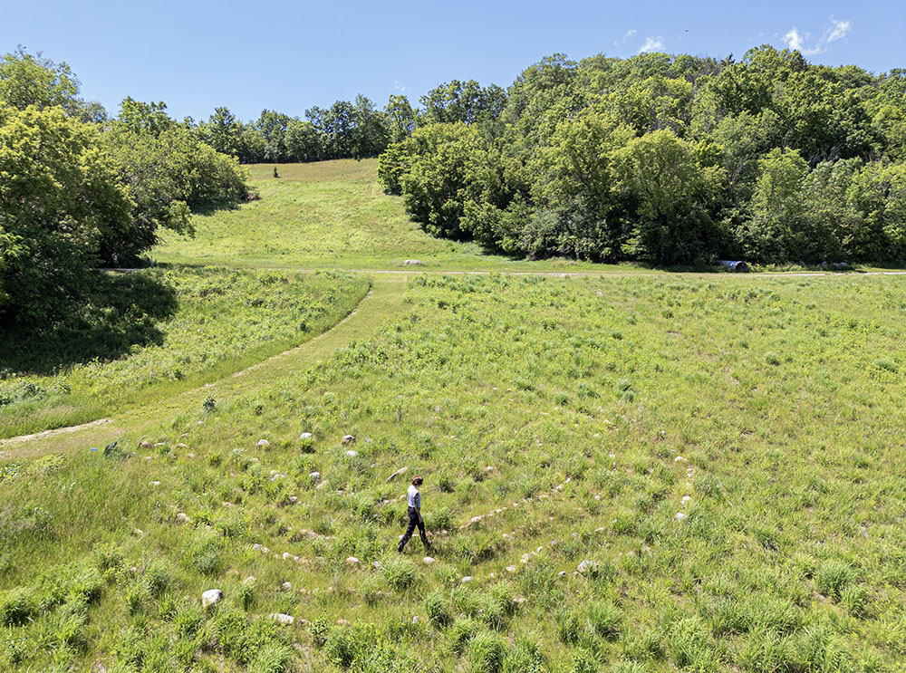 Amanda walking the slightly overgrown labyrinth. 