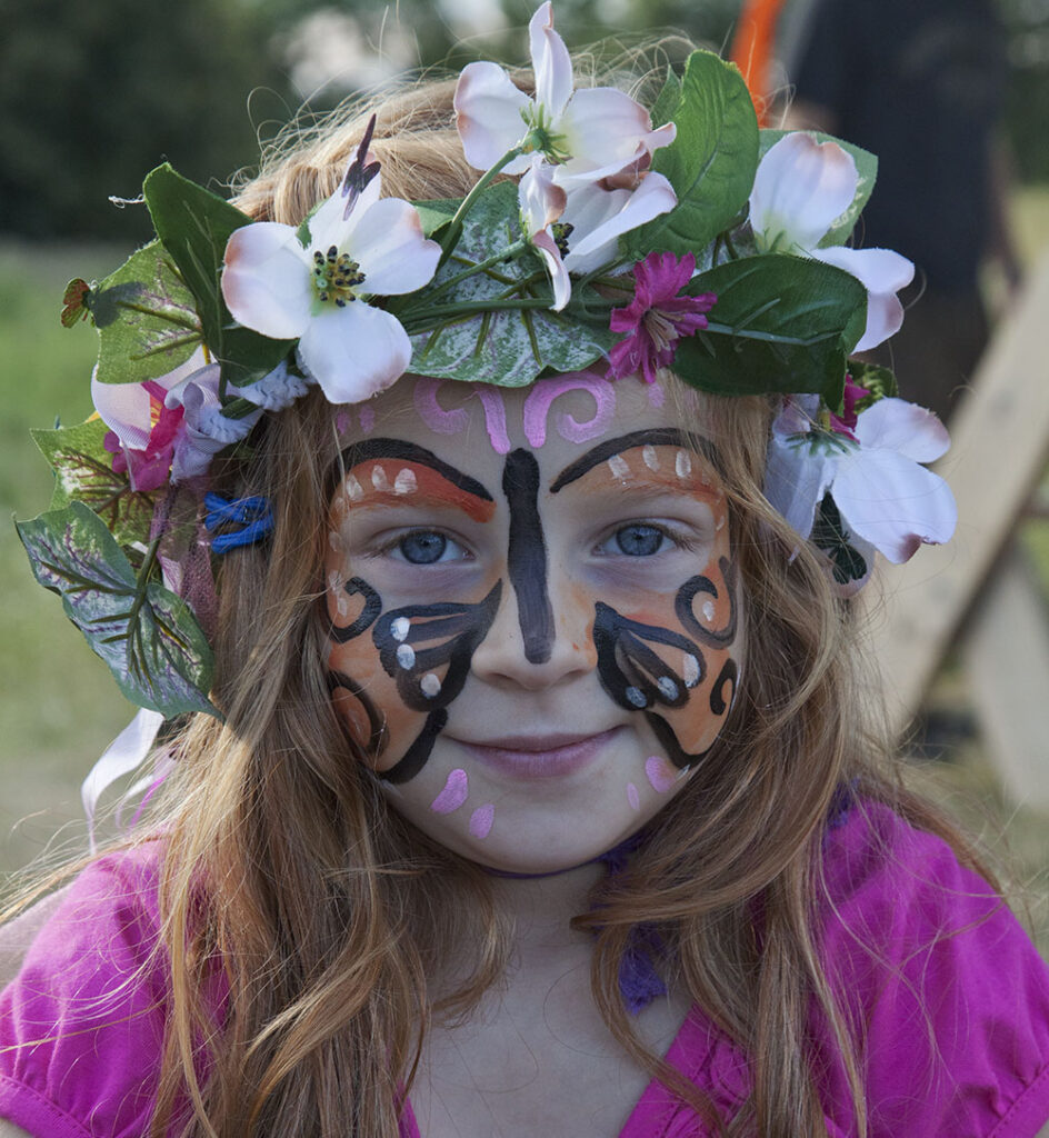 A youngster decked out as a monarch at a Friends of the Monarch Trail migration celebration event.