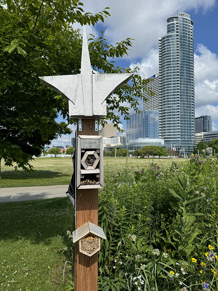 A "bug hotel" gives pollinator bees a place to shelter in the park.