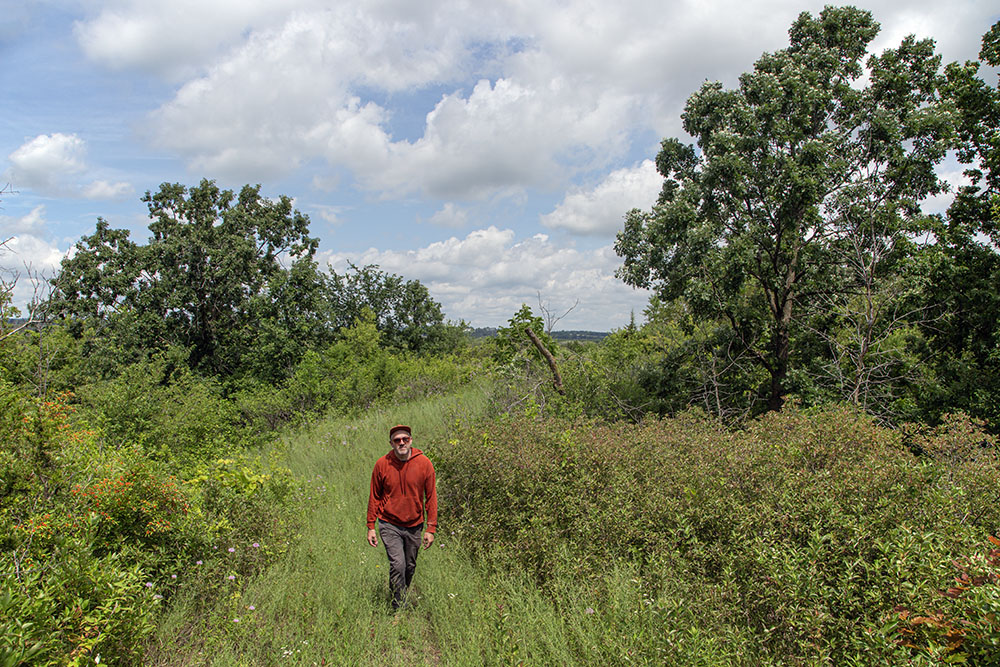 The artist hiking at Biehl Nature Preserve.