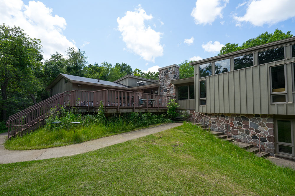 The back of the Hausmann Nature Center features a patio where guests can relax in the sun.