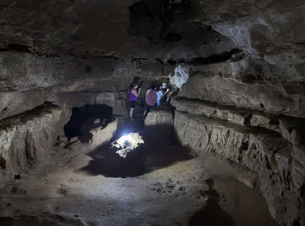 Some of the group explore the back end of the Bat Cave.