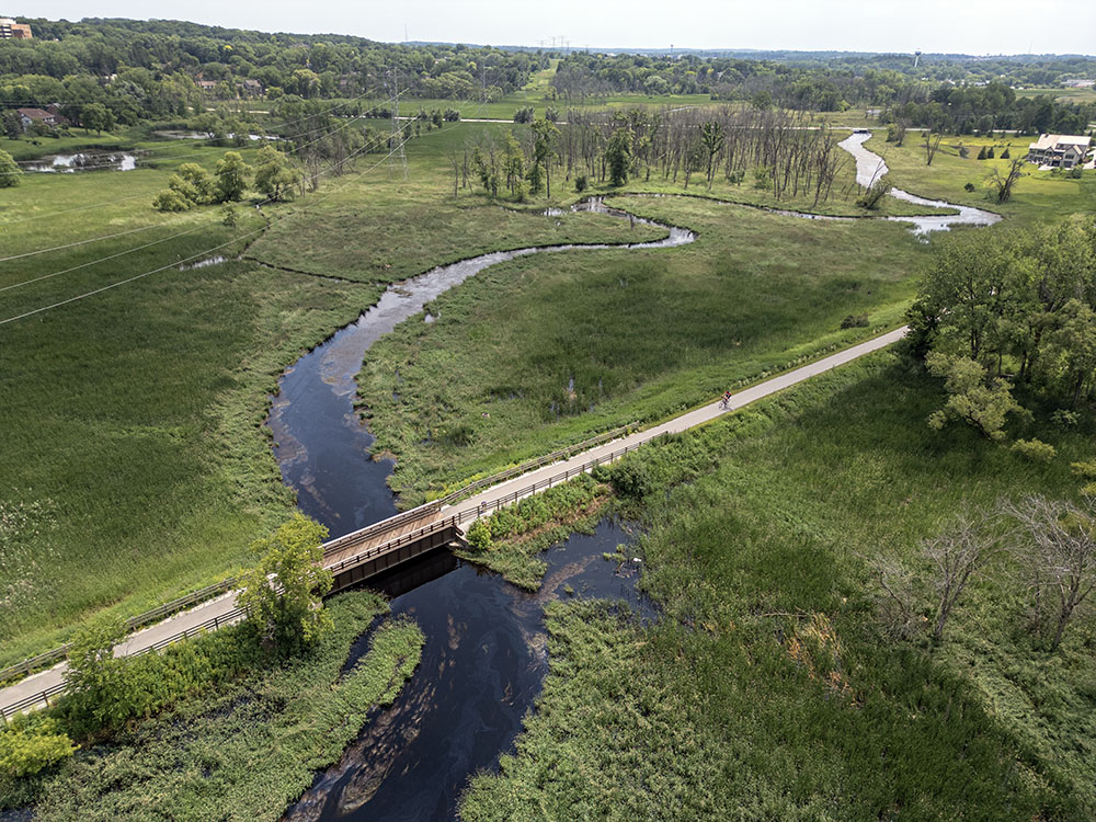 The 3-mile Fox River Trail crossing the Fox River in the Fox River Conservancy in Brookfield.