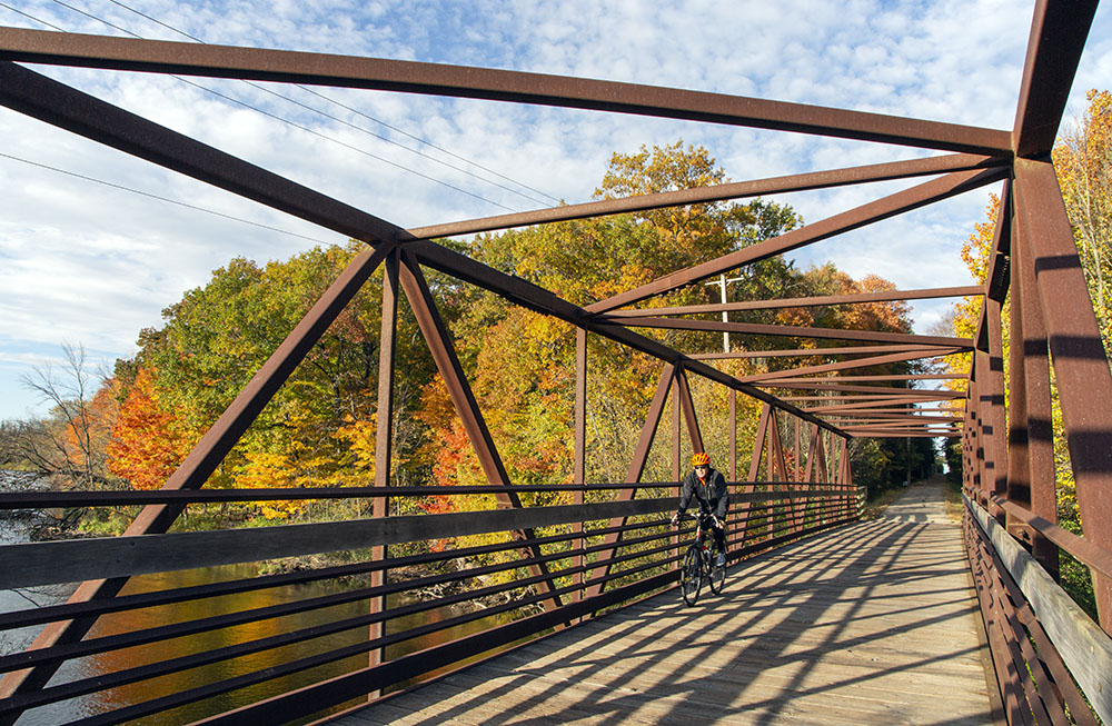 The Ozaukee Interurban Trail bridge crossing the Milwaukee River at Bratt Woods Nature Preserve in Grafton.