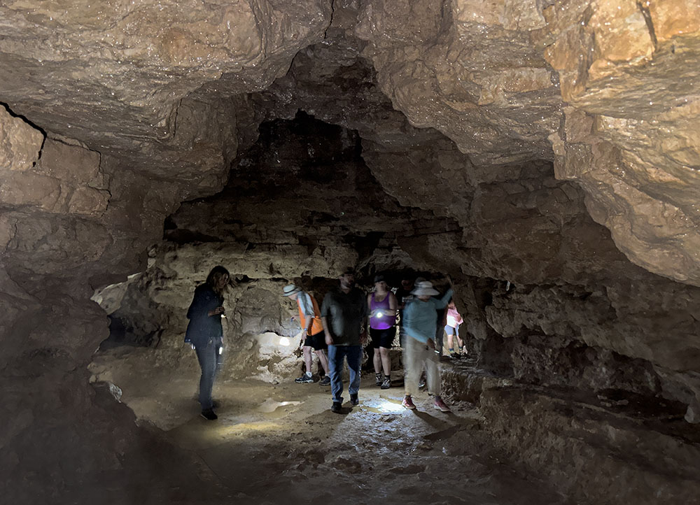 Minerals in the rock sparkle when illuminated by our flashlights in Wayne's World.