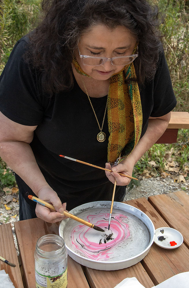 Adding two colors to the surface of the water.