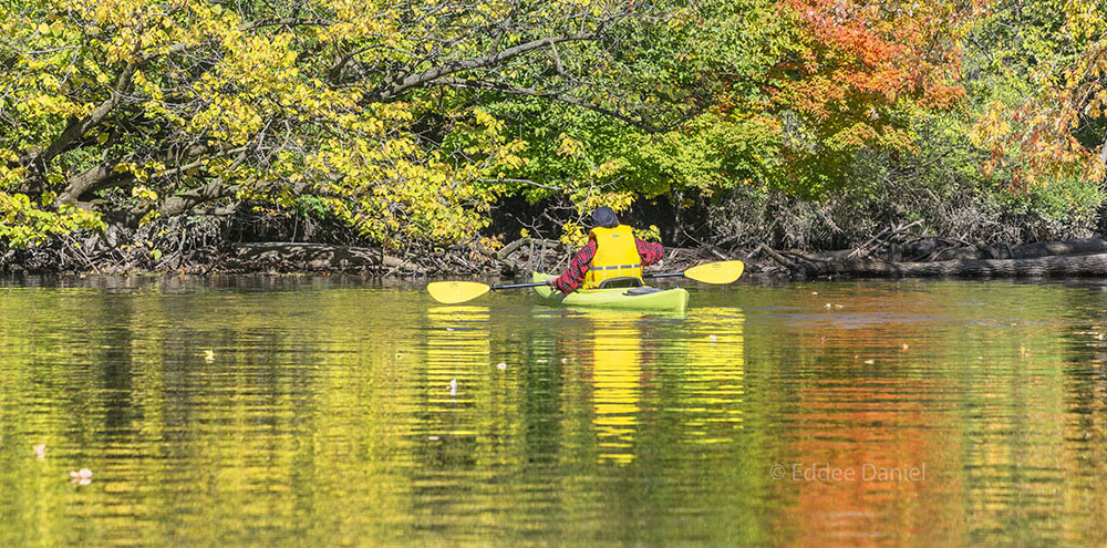 Solitary kayak and autumn foliage