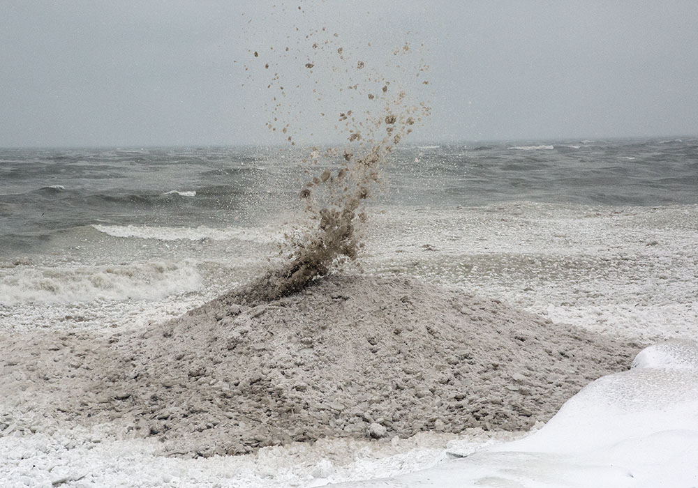 An "erupting" ice-cano on the shore of Lake Michigan in Big Bay Park.