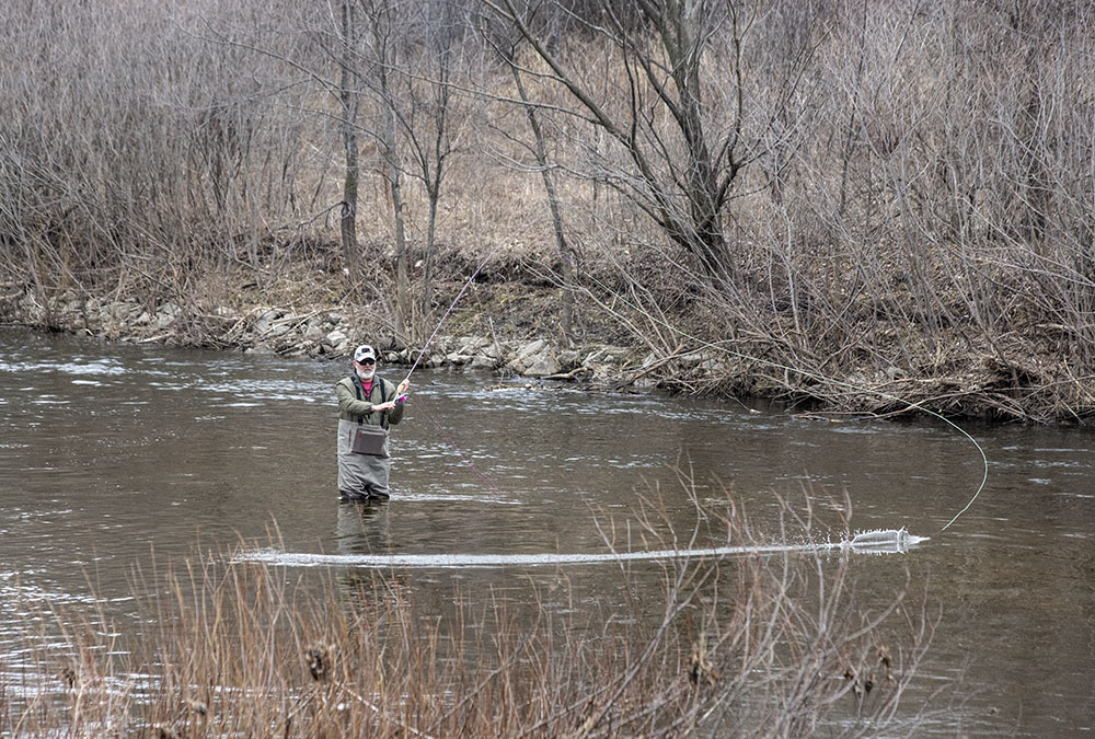 Fly fishing in the Menomonee River.