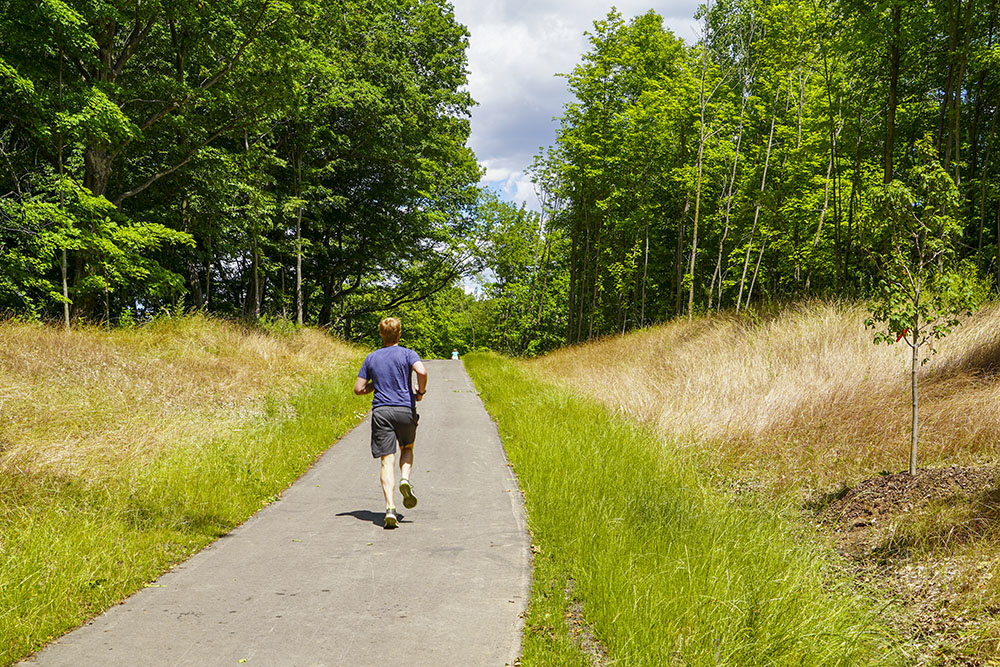 Jogger on the Greenway Trail. Photo courtesy raSmith.