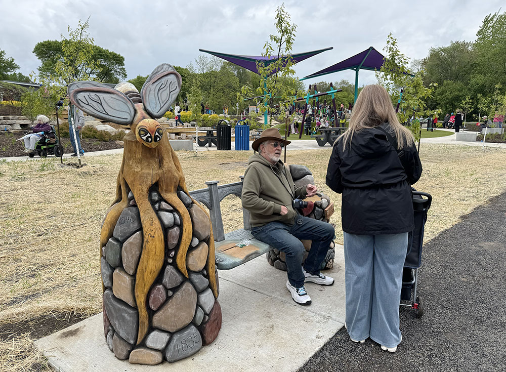 This firefly bench is one of five artist-designed benches in the park.
