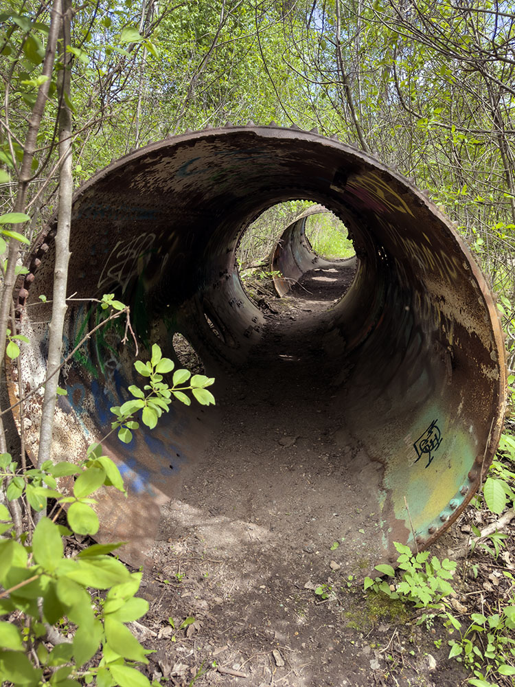Tunnel-like pipes are among the ruins that remain of the marl processing plant that once operated here.