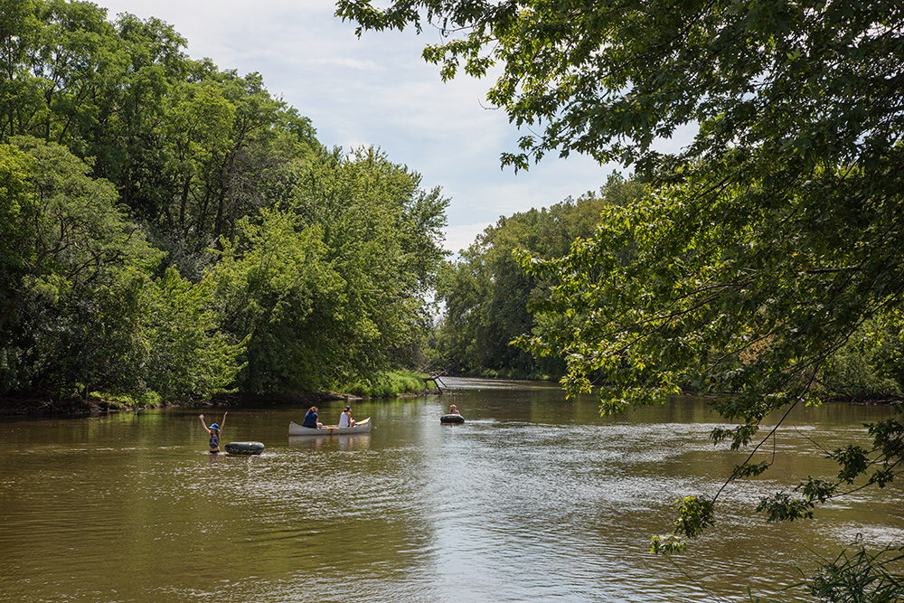 Paddling and bathing in the Fox River at Fox River Park in Silver Lake, Kenosha County.