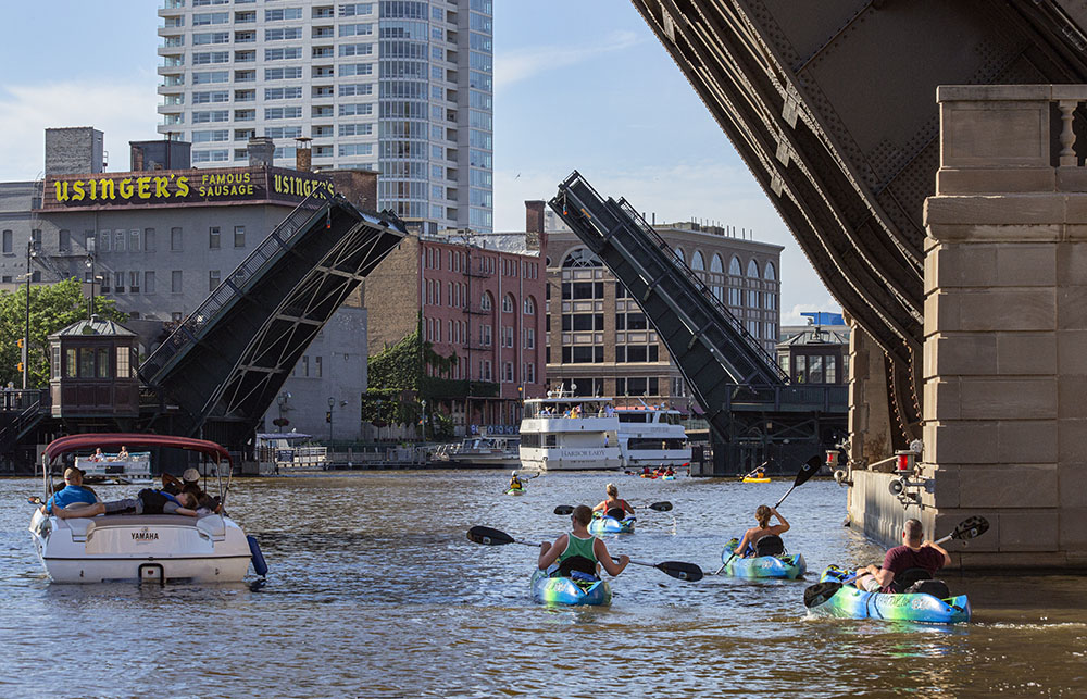 The Milwaukee River estuary has become a popular place to paddle, alongside all the motor boats!