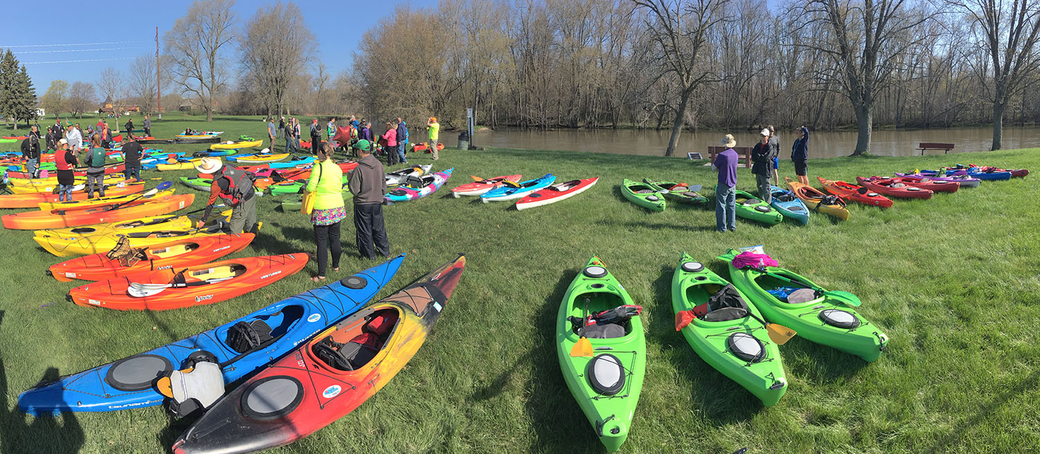 Kayaks laid out in Linnwood Park, Caledonia, for the Root River Challenge