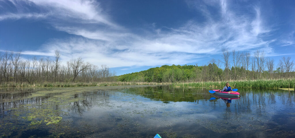Paddling upstream on the Oconomowoc River towards Loew Lake.