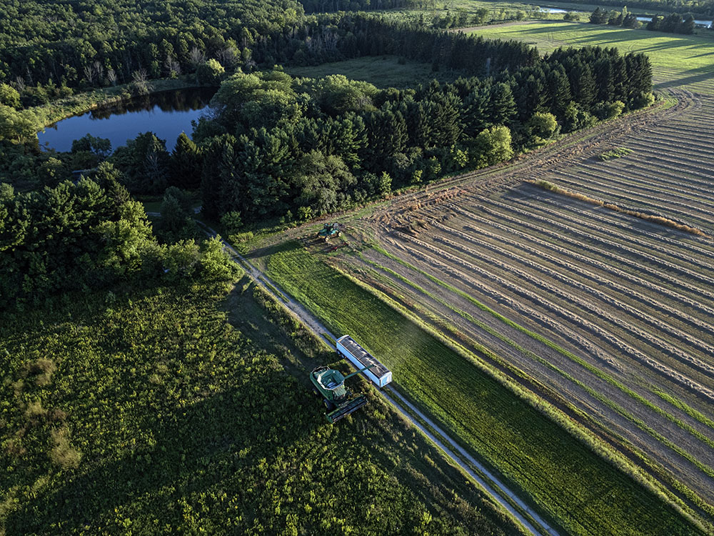 A harvester at work on the still-active farmland in Spirit Lake Preserve.