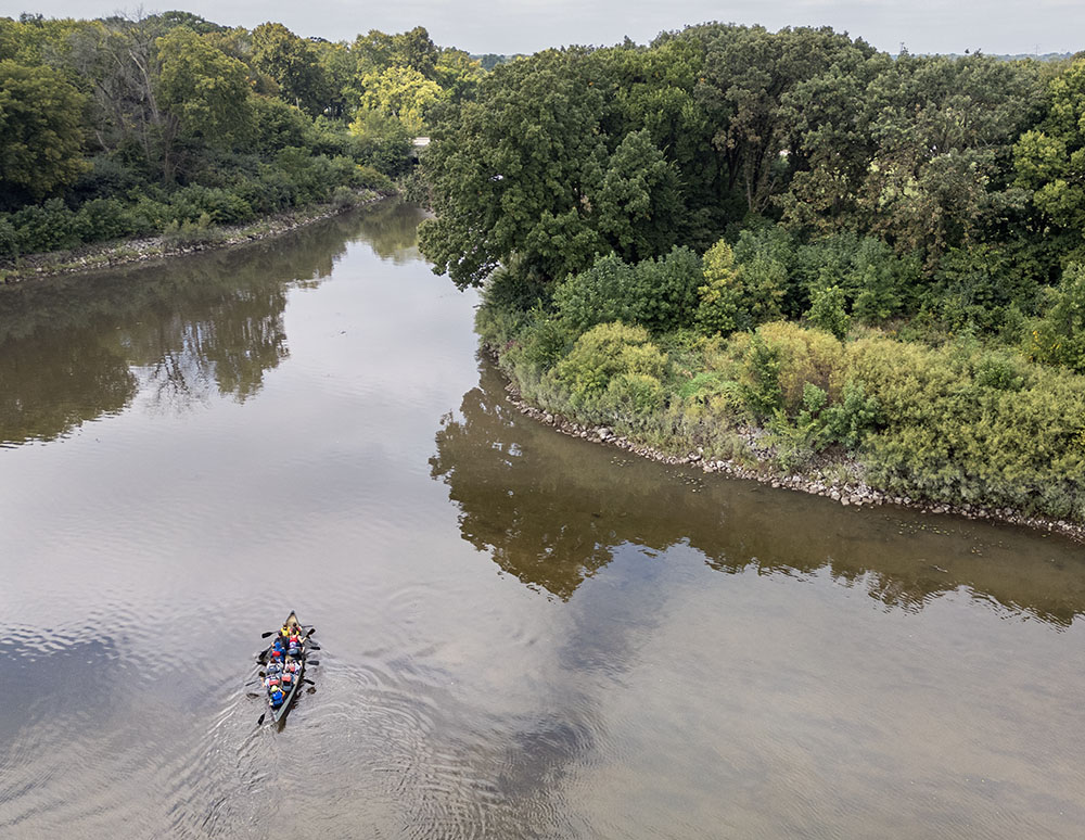 Drone's-eye view of the canoe in the middle of the Milwaukee River.