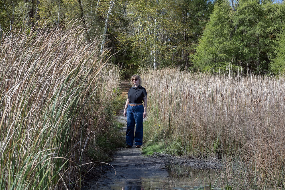 Melissa Wagner-Lawler on the Lake Twelve pier at Biehl Nature Preserve.