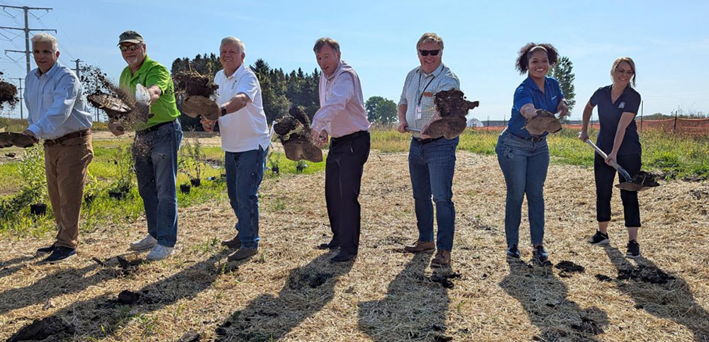 Officials breaking ground on the restoration project